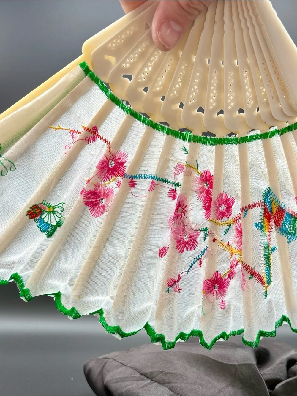 White Embroidered Folding Hand Fan with Pink Floral Design and Green Trim